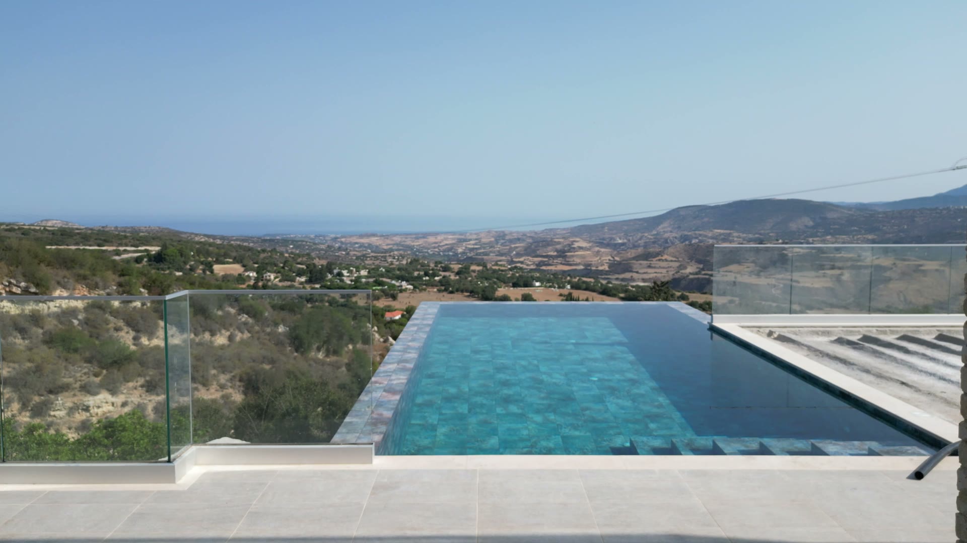infinity pool mediterranean sunset panoramic
